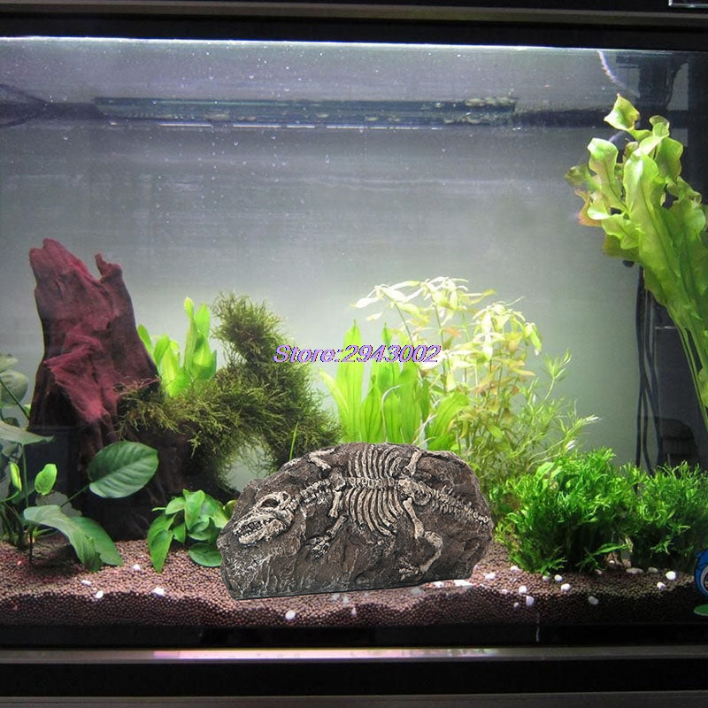 dinosaur fish tank accessories MTGHYARE 2 Pack Aquarium Decorations Skull Aquarium Ornament Mini Dinosaur Mold Decoration Reptile Hide Decor with Holes Tank Landscape Reptile Betta Fish Hideout Caves : Pet Supplies The sturdy base of this ornament ensures it stays firmly in place within your aquarium Resin Aquarium Landscaping Paperweight Dinosaur